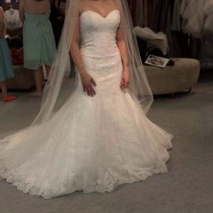 Selling Alfred Angelo lace style 2438 wedding dress from the 2015 collection.
